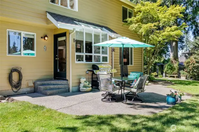 Enjoy a spacious patio for extending your gatherings outdoors.