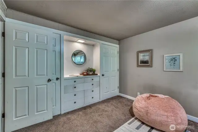 This room features TWO closets in addition to the built ins!