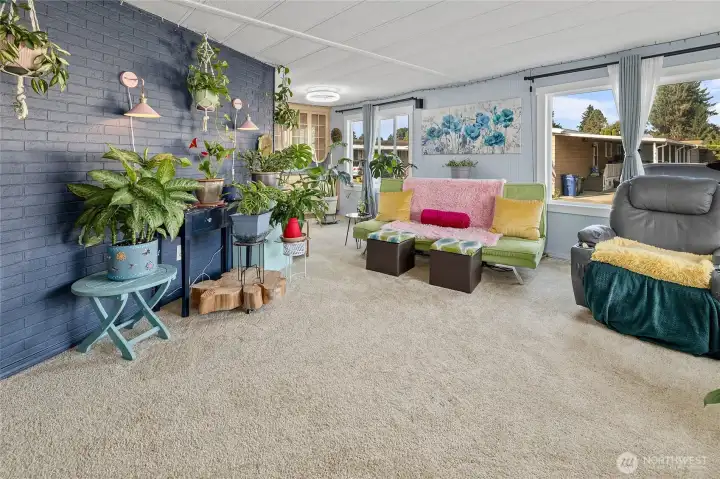 The Living Room is very spacious and open, new paint, new flooring, new windows and lots of natural light!