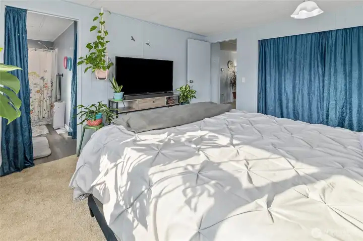 Primary bedroom looking into NEW completely updated bathroom!