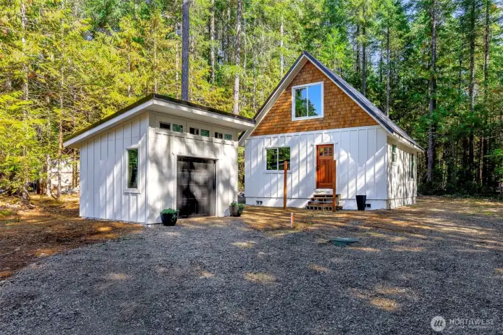 All the hard work is done...This beauty is ready for the final finishes! Beautiful lot with circular drive, sunny interior and tree's left around the perimeter for privacy. Home is framed with windows, doors, and roof.  24' x 24' footprint with 576 SQ FT on the main floor and 288 SQ FT loft. Owner will transfer the permit to your name and you can choose all the finishing touches! Located in Lake Cushman Div# 5 in Hoodsport.  99 year lease expires Apr 2065.