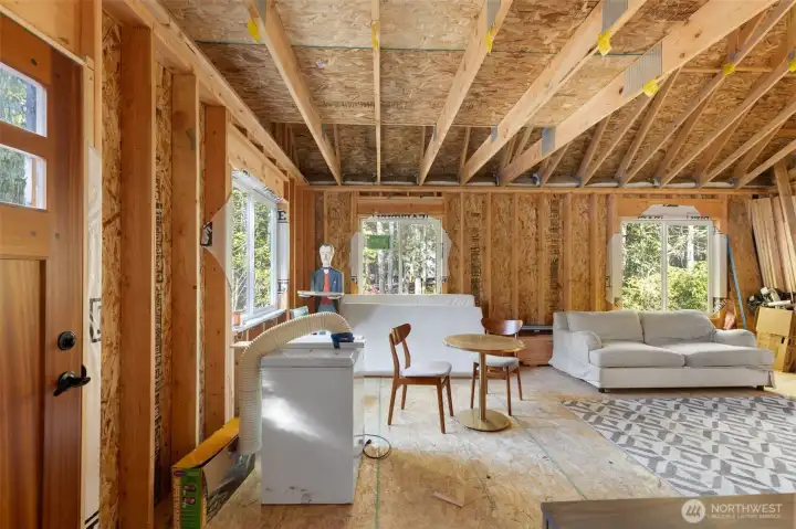 Great design, lots of natural light, vaulted ceiling.  Plans show circular staircase to the loft.