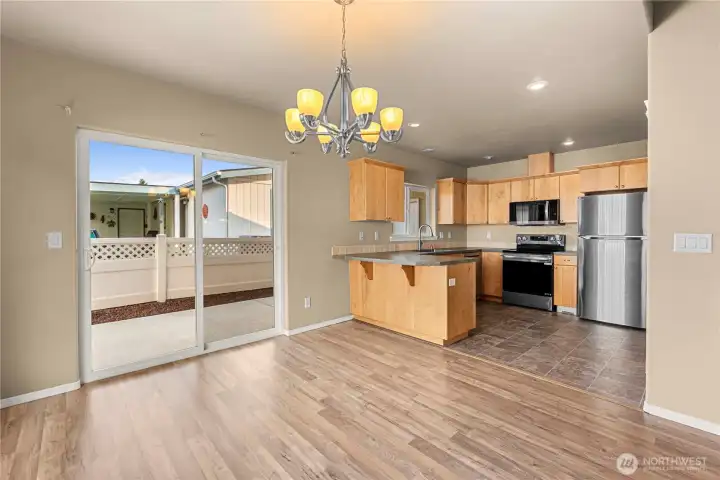 Dining Room Into Kitchen with covered patio access