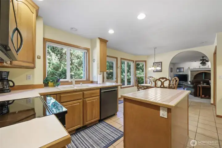 Bright and open.  Hard Counter tops and tile floor