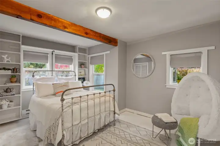 Guest bedroom. Stay toasty all winter with electric heat, and a freestanding stove.