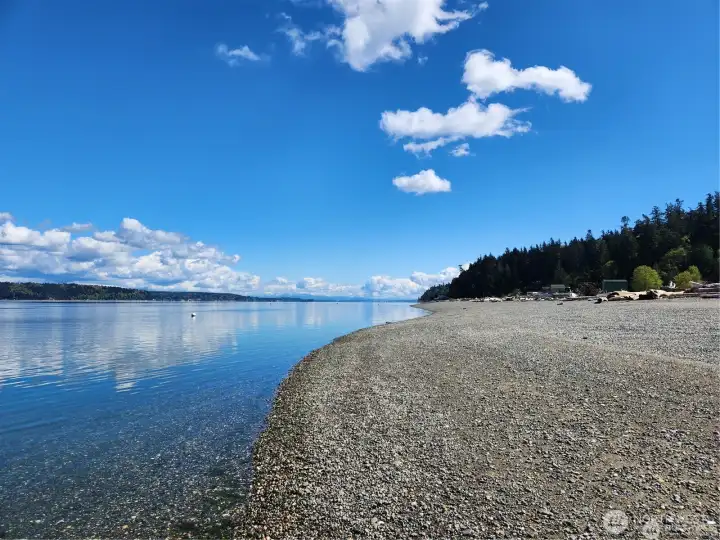Community beach, where each owner has their own private property, but all share the beach. Quick walk, drive or ATV ride.