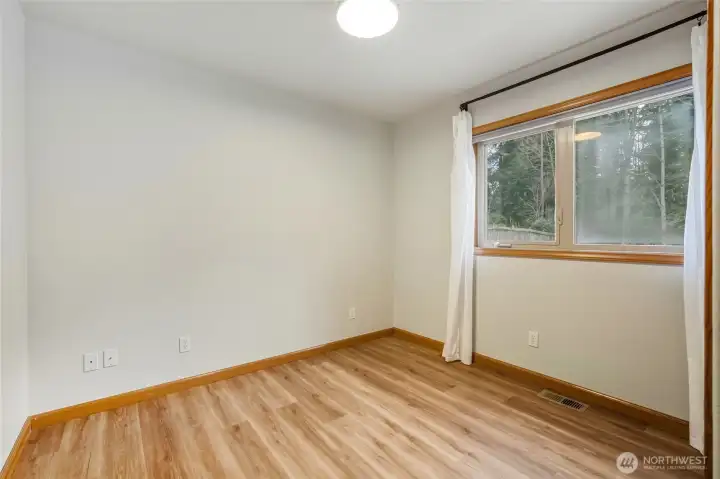 Main Floor Guest Bedroom w/closet.
