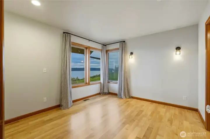 Main floor view “bonus” room adjoining for flex space or additional guest room, 3 bed septic but 5 total “rooms”.