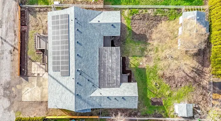 Generous 1/4 acre lot with potential alley access