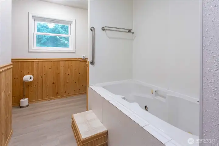 Bathroom with wood paneling