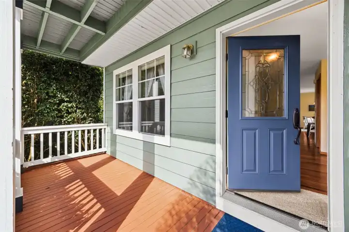 Covered Front Porch is great for enjoying the beautiful views of the pocket park in front of house.
