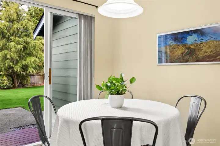 Breakfast nook with access to yard off kitchen