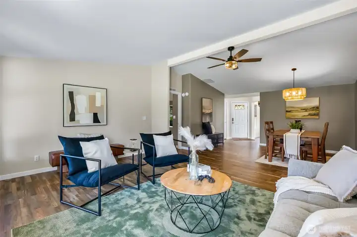 Great room looking to entry and formal dining area