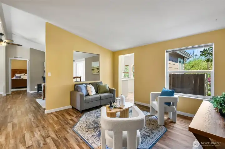 Den or TV area located off the kitchen
