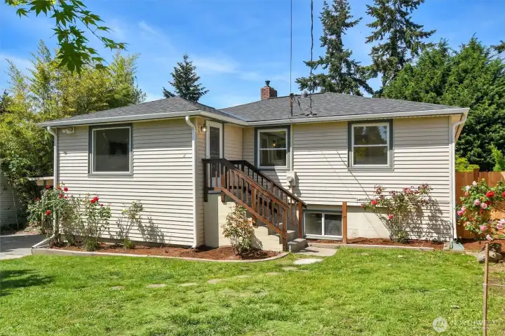 Charming exterior showcasing mature landscaping, large lot, and curb appeal in desirable Highland Park West Seattle. Charming exterior showcasing mature landscaping, large lot, and curb appeal in desirable Highland Park West Seattle.