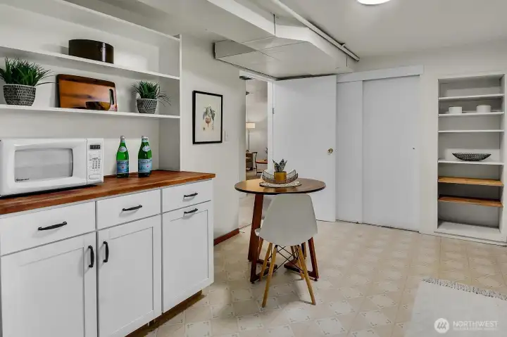 Bright second kitchen with pantry storage, separate entrance access, and updated finishes for added versatility. Bright second kitchen with pantry storage, separate entrance access, and updated finishes for added versatility.