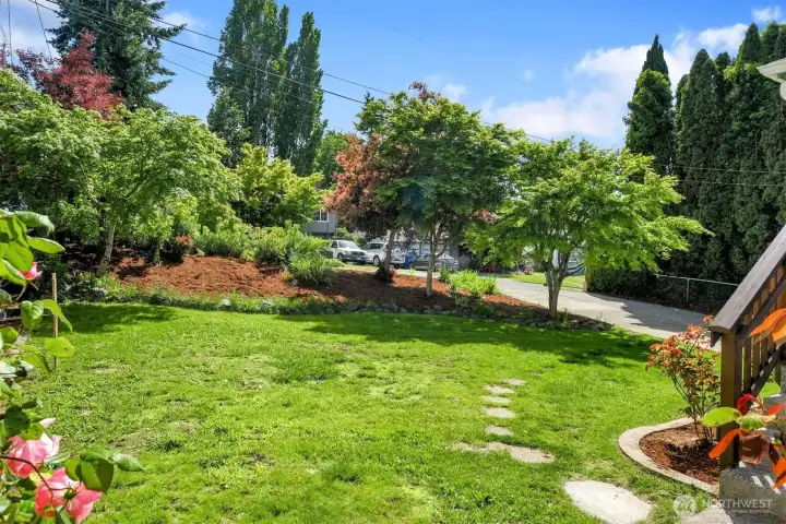 Rare oversized lot with expansive green space, mature rose bushes, and endless gardening or entertaining opportunities. Rare oversized lot with expansive green space, mature rose bushes, and endless gardening or entertaining opportunities.