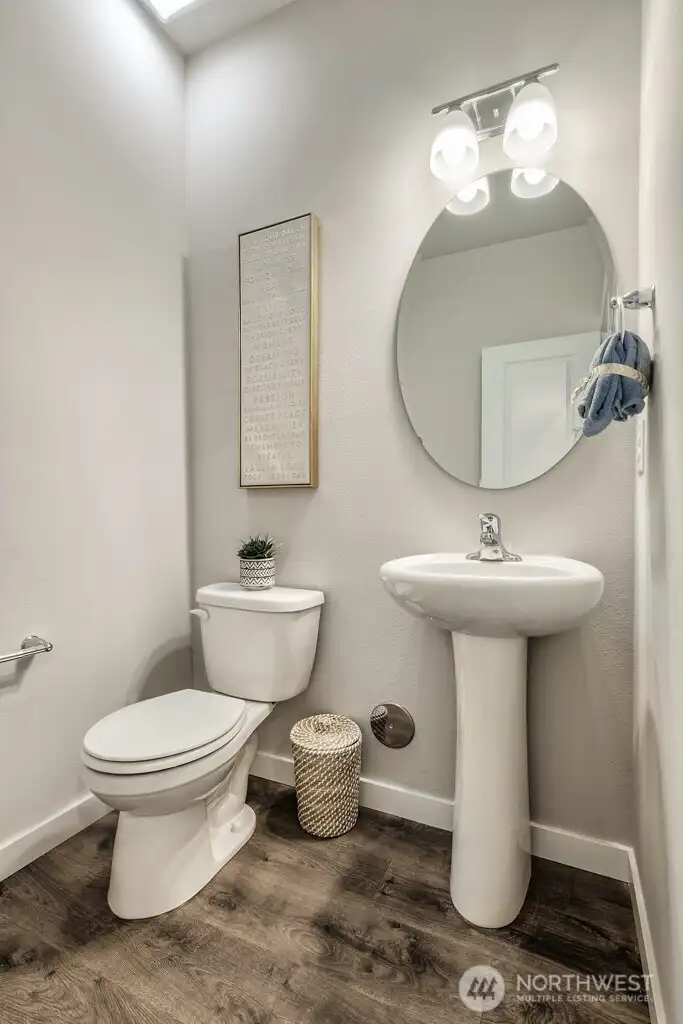 Powder bathroom. Photos are for representational purposes only. Colors and finishes may vary. Powder bathroom. Photos are for representational purposes only. Colors and finishes may vary.