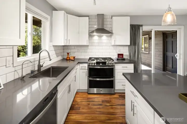 Lots of counter space and storage as well as a sunny window overlooking the backyard.