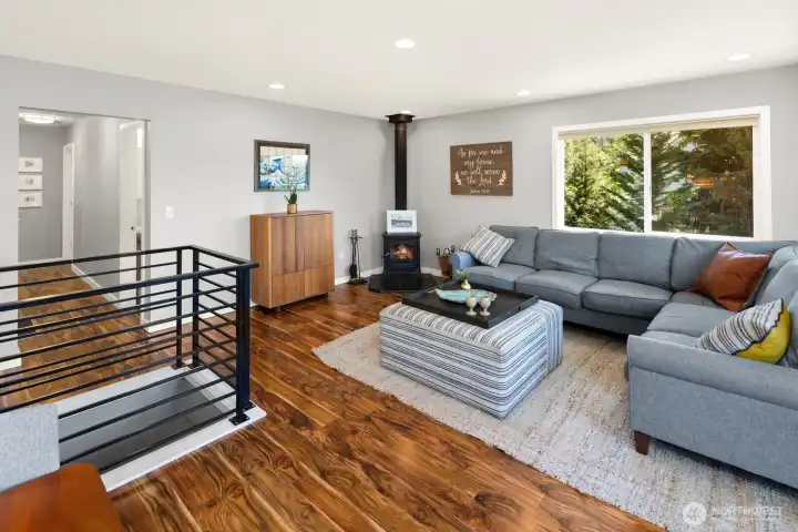 Living Room.  Hallway leads to bedrooms and full upstairs bathroom.