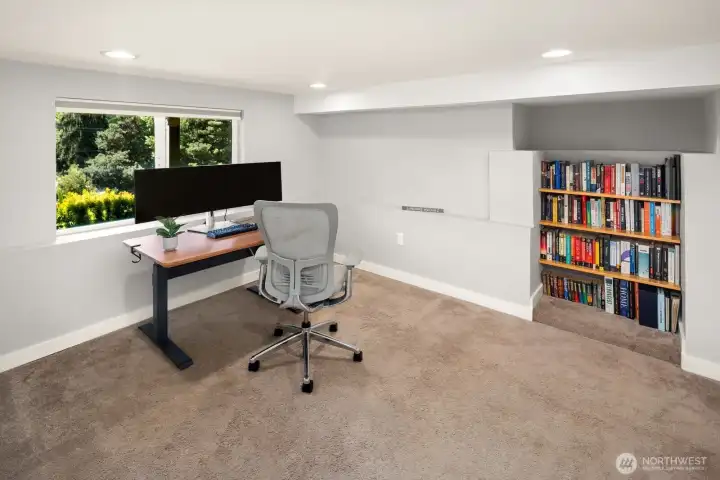 Home office downstairs has built in book cases and extra storage - you can stay in a quiet part of the home and "get away from it all.  And you can't beat the commute!