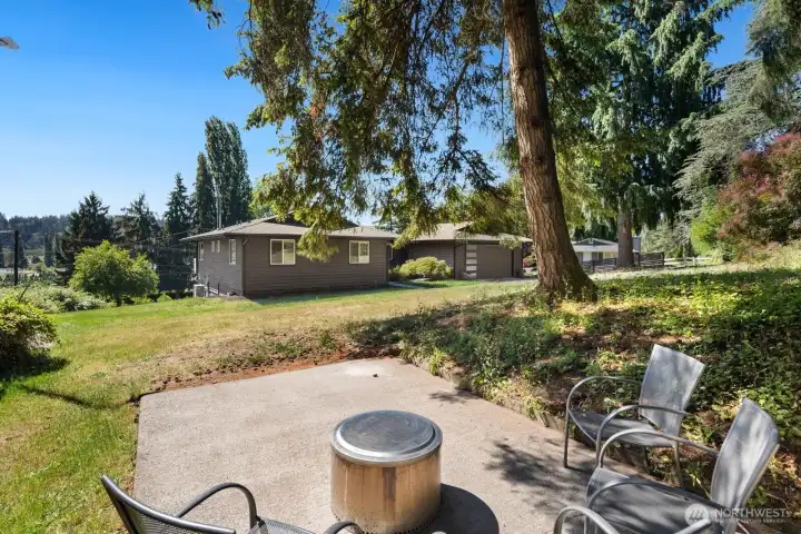 This Patio on the SE corner of the property offers space for a little firey-fun away from the house!