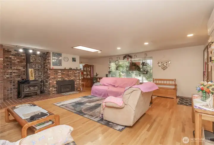The inviting living room offers a warm and welcoming atmosphere with an open, comfortable layout designed for both everyday living and entertaining.