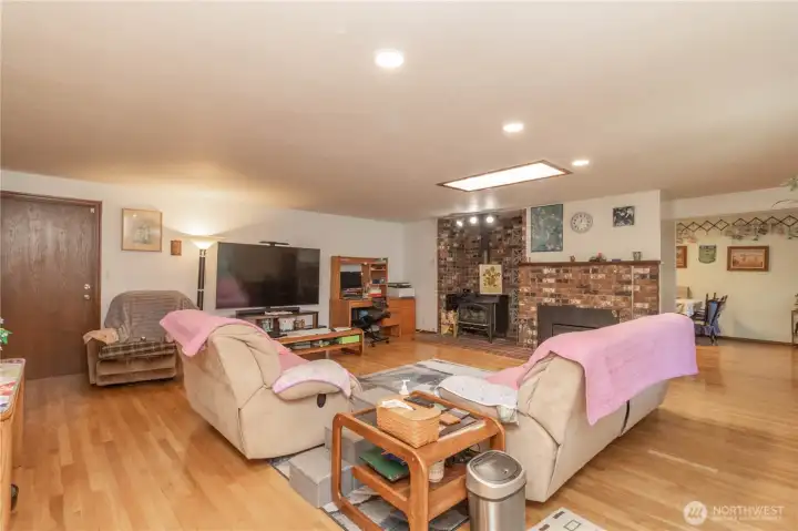 The inviting living room offers a warm and welcoming atmosphere with an open, comfortable layout designed for both everyday living and entertaining.