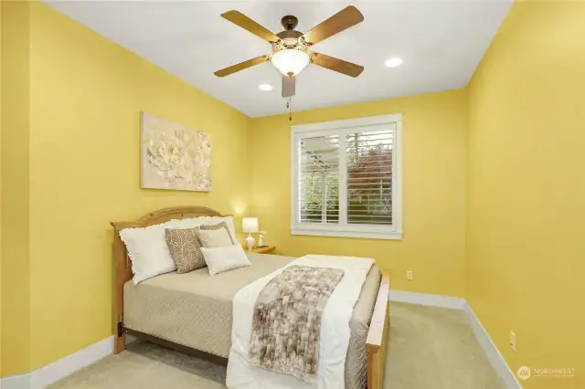 The main floor offers a versatile guest suite or den with an adjacent 3/4 bath with shower, while upstairs you'll find 4 spacious bedrooms and 3 baths.