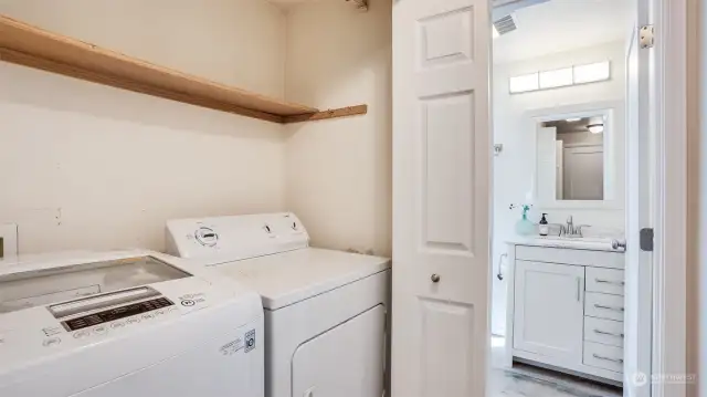 Utility room is located right off the entry, both washer & dryer stay!