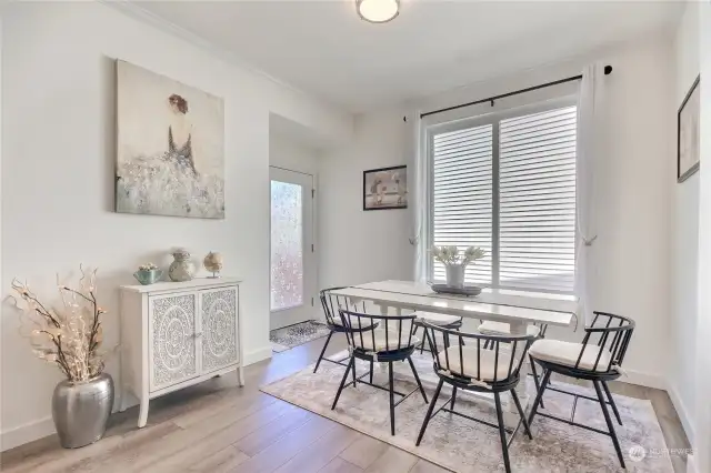 Big dining area with door leading to private backyard