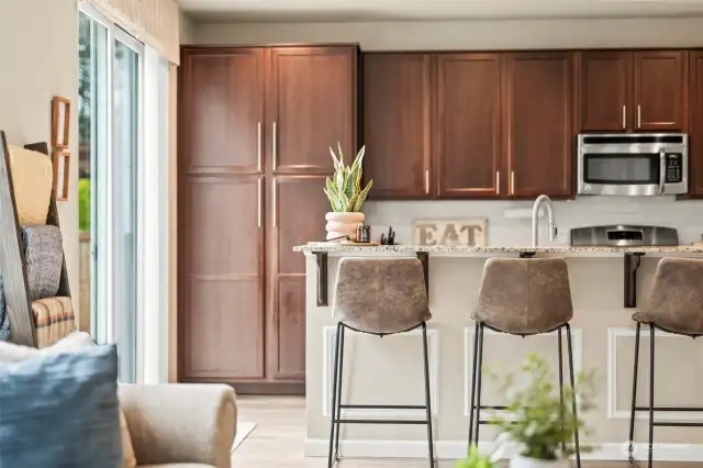 Rich wood cabinets warms this space up