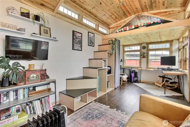 So, there's this incredible separate structure, has so many possibilities! Right now, used as an office & guest cottage. I adore the stairs going up to the loft bed...the vibe and energy in this structure is really special.