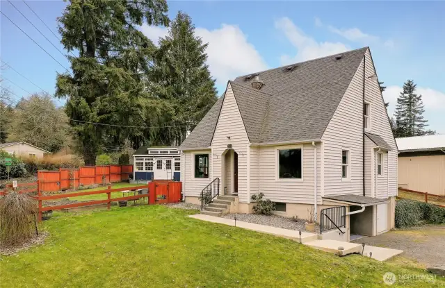 Drone view of front-right side of property, 3 levels of living!