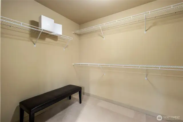 The spacious walk-in closet provides ample room for all your wardrobe essentials, with generous hanging space and convenient shelf storage. Its large size ensures easy organization, keeping your clothing and accessories neatly arranged and easily accessible.