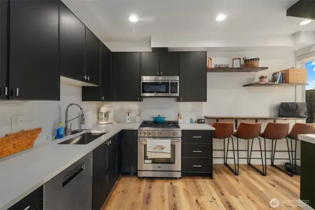 Tons of storage through the open concept kitchen.