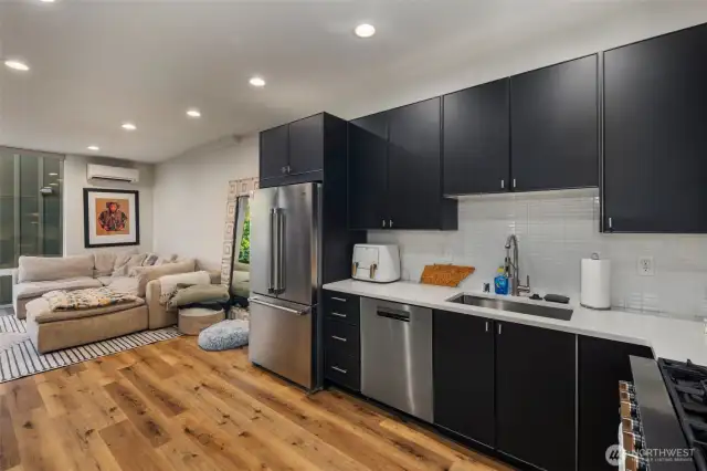 Seamless living room to kitchen for easy entertainment.