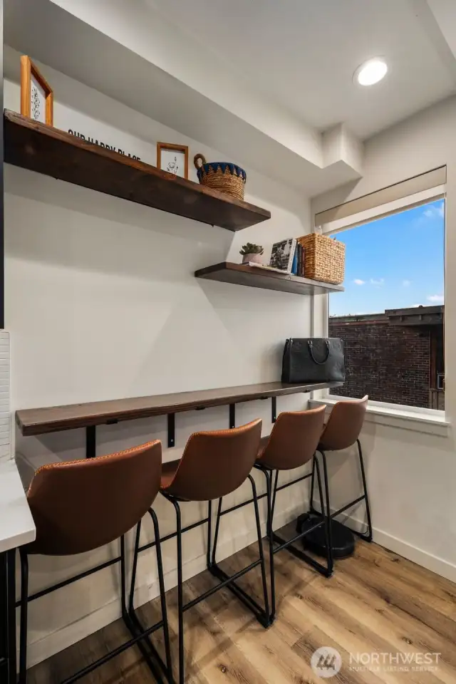 Custom eating bar with floating shelving.