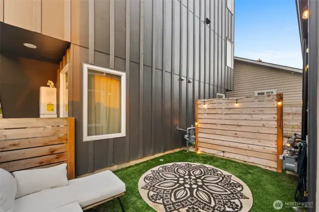 Cozy outdoor area off the entry.