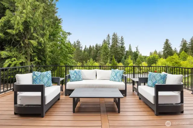 Large deck accessed from the dining area provides both privacy and territorial view