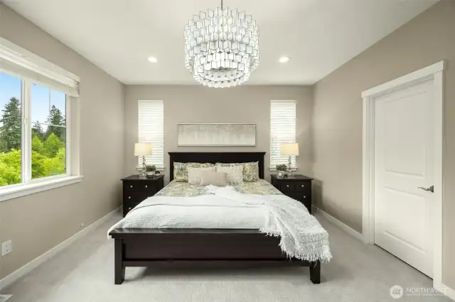 Enter the private 2nd floor primary retreat with designer light fixture