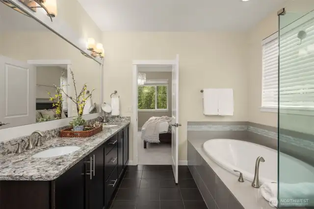 Notice primary bath comes with double vanity, soaking tub and shower