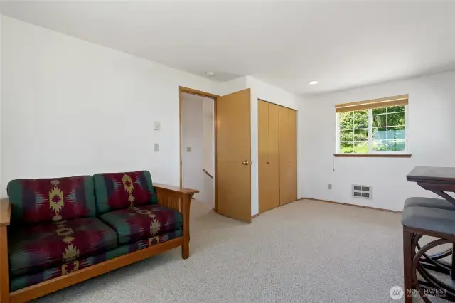 Upstairs bedroom # 1, has lots of natural light with incredible water & mountain views as well.