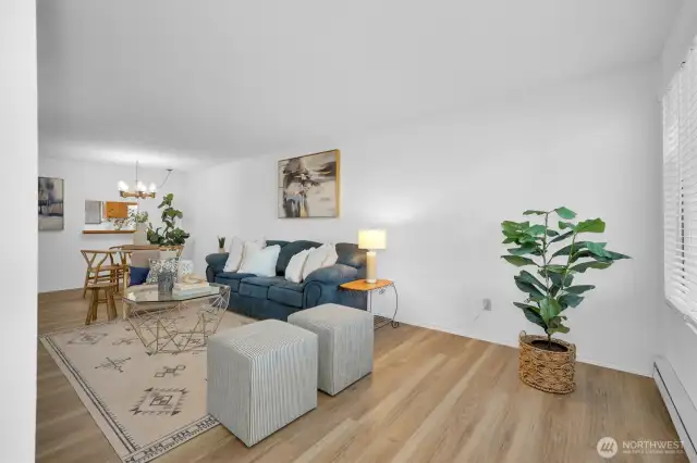 Seamlessly connects the living room, dining area, and kitchen