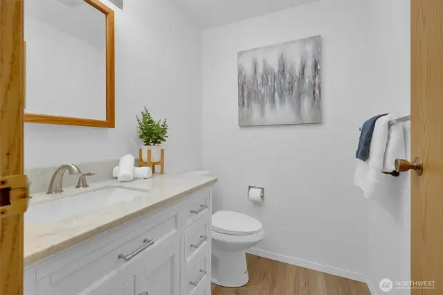 Main floor 1/2 bathroom. Centrally located just off the main living areas for easy access.