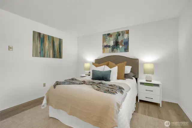 Oversized bonus-style bedroom sits at the end of the hall—large enough to be used as a second primary.