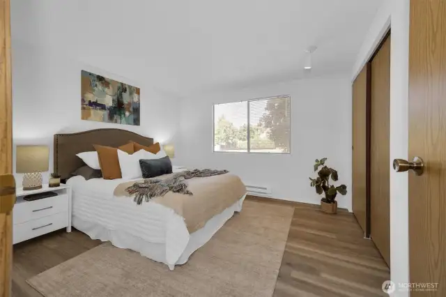 Oversized secondary bedroom that could easily flex as a second primary.