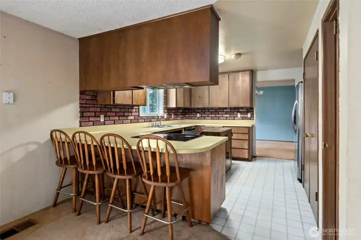 Eating bar area with stools.