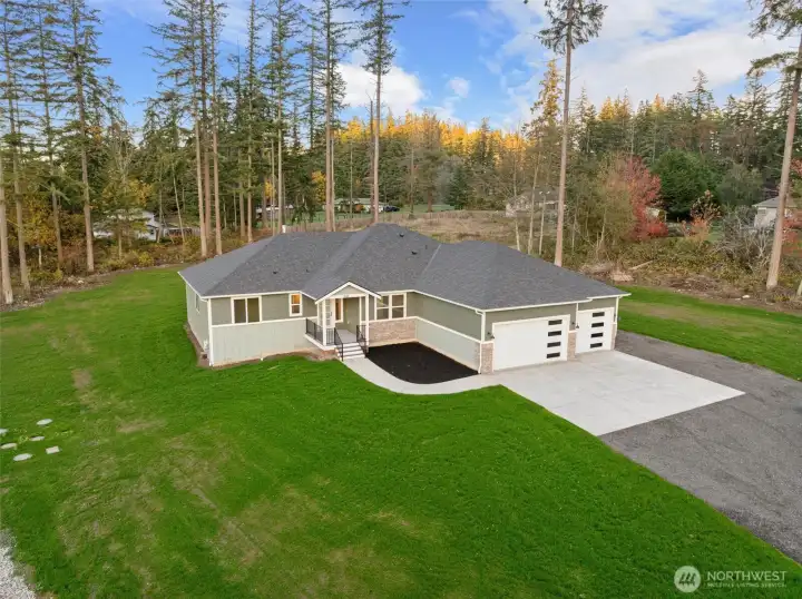 3-Car garage with room for RV parking or shop!