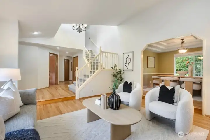 open living room with sculpted entryway